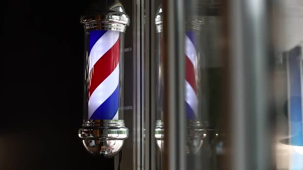 Barber shop vintage pole. copyspace Barbershop. Barber shop pole in red white and blue 