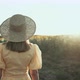 Unrecognizable Woman in Retro Dress Walking Alone Near Sunflowers Field - VideoHive Item for Sale