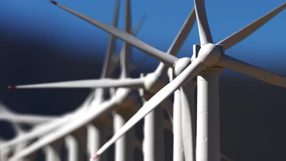 Wind farm against the sky, an animation on the theme of renewable electricity alt