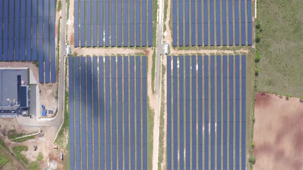 El Soco solar photovoltaic park of San Pedro De Macoris in Dominican Republic. Aerial top down view alt