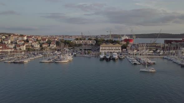 Aerial footage of Trogir port with boats in Croatia on the Adriatic sea. Old town