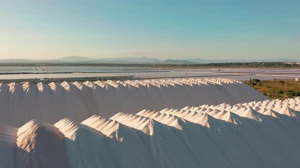 Aerial View of Industrial Extraction of Salt in the Desert, Pile of Salt alt