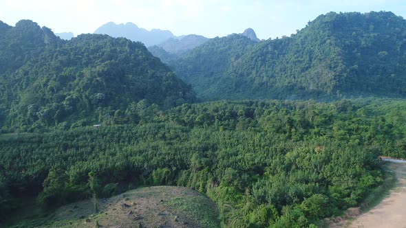 Natural landscapes around the city of Vang Vieng in Laos seen from the sky alt
