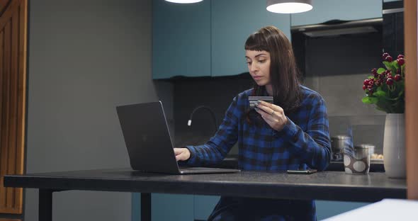 Young Caucasian Girl with Laptop in Modern Apartment alt