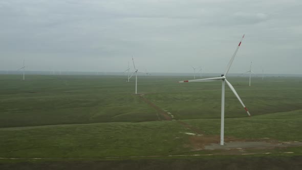 Aerial View of Powerful Wind Turbine Farm for Energy Production alt