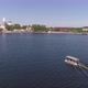 Aerial view of pleasure boat with people floats on the pond in provincial city 22 - VideoHive Item for Sale