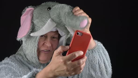 Closeup Shot of a Middleaged Lady in an Elephant Costume on a Video Call