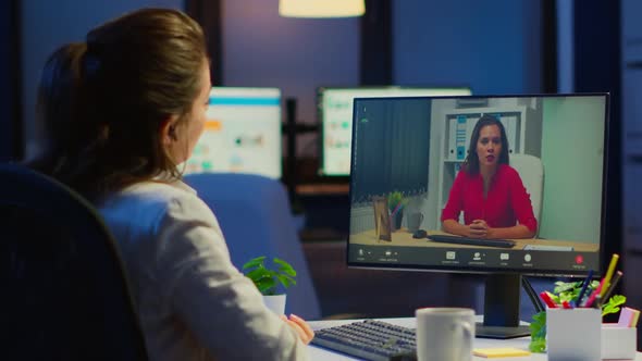 Freelancer Working Remotely Discussing with Woman Partner Online alt