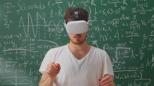Portrait of Bearded Teacher Wearing Virtual Reality Headset in School Classroom alt