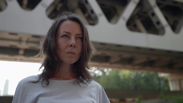 Nervous Woman is Walking Alone in City at Summer Day Anxious Face Expression alt