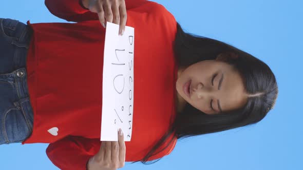 Young Woman Holding Discount Sign alt