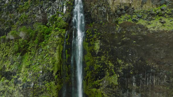 Impressive Bridal Veil falls down steep cliff into Atlantic, aerial reveal alt