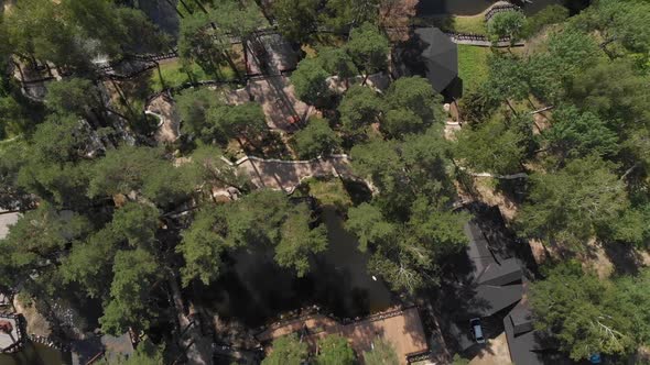 The Camera is Flying Over the Park Area alt