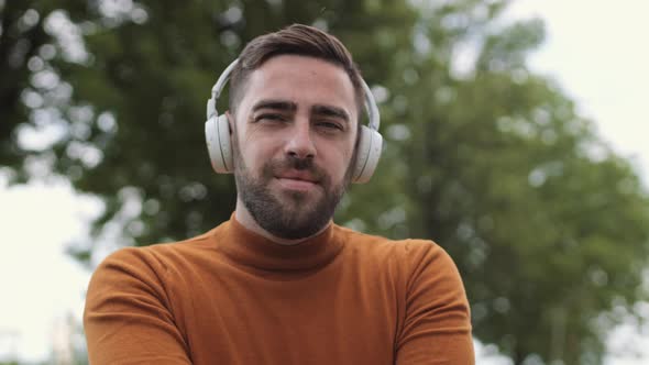 Portrait of Man Listening to Music alt