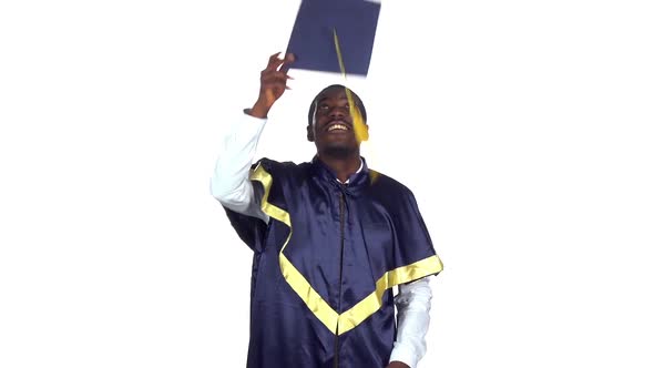 Student Picks Up Square Academic Cap and Throws, Slow Motion alt