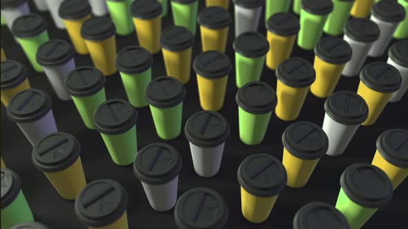 Three colored coffee cups background yellow green white