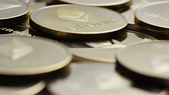 Rotating shot of Ethereum Bitcoins (digital cryptocurrency) - BITCOIN ETHEREUM 0055 alt