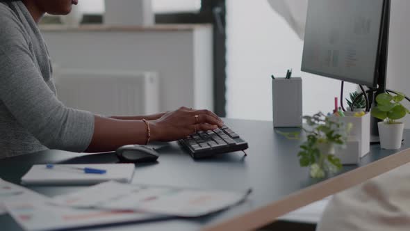 Closeup of Student Hands Typing Education Article on Keyboard Using Computer alt