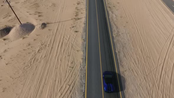 Sport Car on the Desert Road