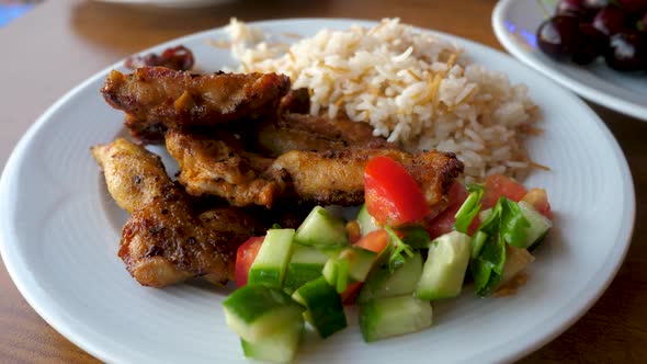 Rice Fried Chicken Sliced Cucumbers with Tomato