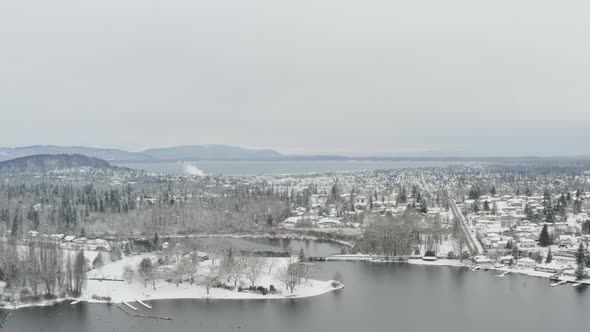 Flying Towards Bellingham Washington Downtown Snowy Winter Landscape Aerial Above alt