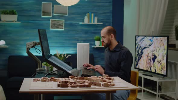 Man Architect Working on Touch Screen Computer alt