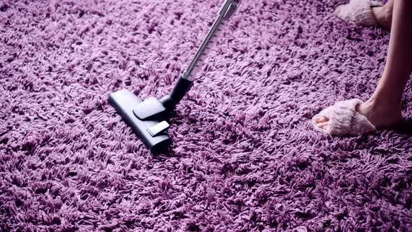 Housekeeping Routine. Domestic Hoover Appliance Cleaner. Maid Clean Dust On Carpet In Living Room. alt