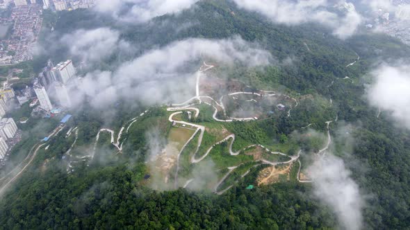 Aerial view Iconic Hill over morning low cloud alt