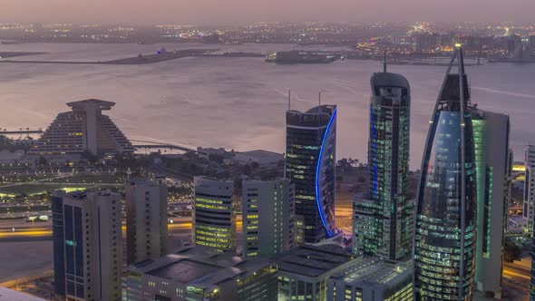 The Skyline of the West Bay Area From Top in Doha Night To Day Timelapse Qatar alt