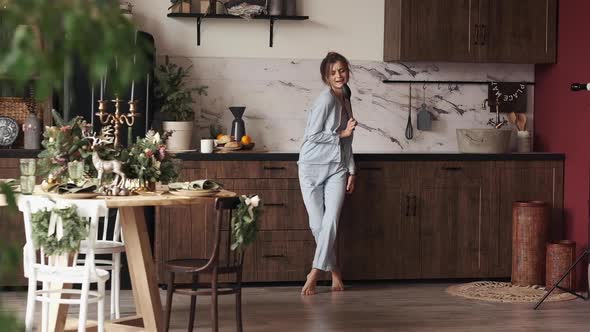 Girl in Pyjamas Having Fun in Kitchen