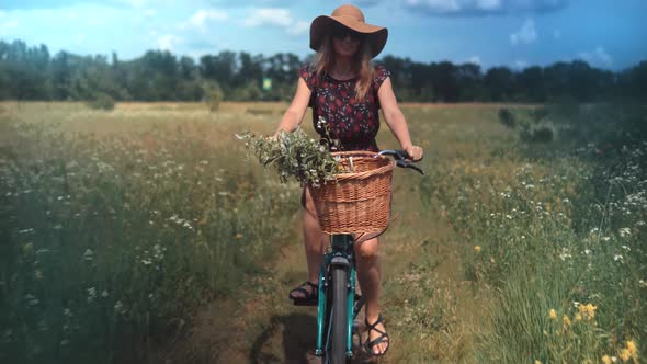 Woman In Hat. Girl Riding On Bicycle. Woman On Bicycle. Woman Bike Riding. .Lady Moving On Bicycle. alt