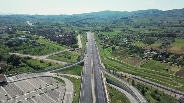 AERIAL WS Parking lot and empty highways amid Coronavirus pandemic / Florence, Tuscany, Italy