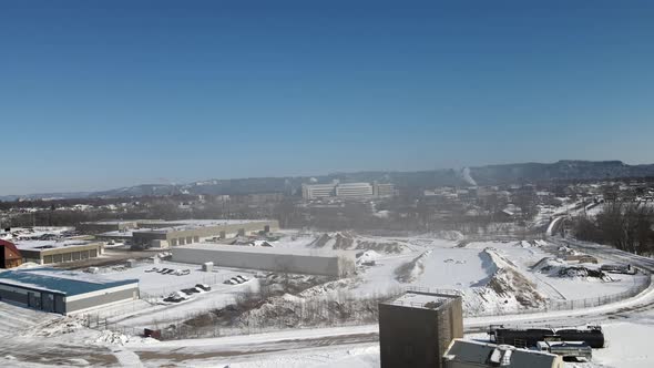 Panoramic view on bright winter looking at snow covered mountains in the background.