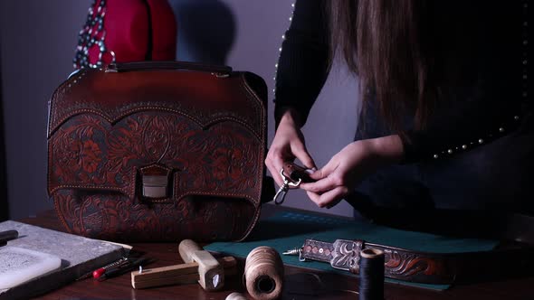 Tanner Woman Making Leather Goods on Workshop