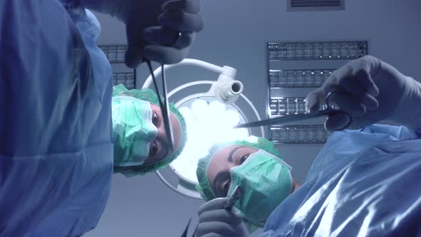 Women Performing Surgery In Hospital Together