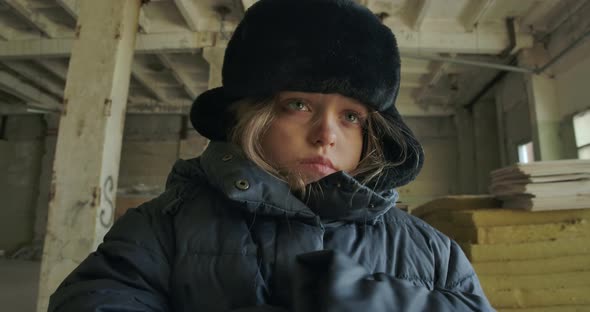 Sick Homeless Caucasian Girl with Grey Eyes Caughing and Looking Away. Sad Hopeless Child Living on alt