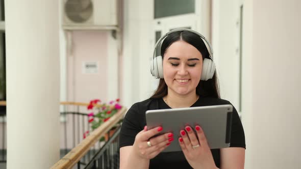 Student Smiling Chatting with Each Other Using Gadget Tablet for Work Office alt