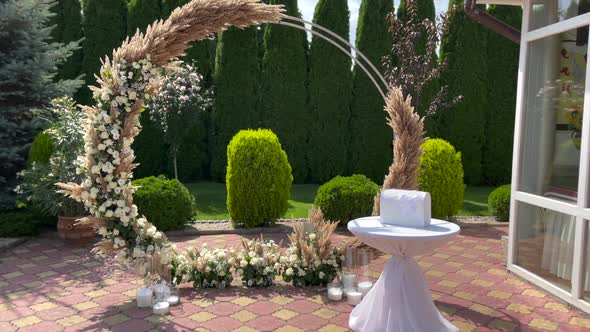 Concept Of Wedding Decor Street Decoration Wedding Arch Is Decorated With Flowers alt