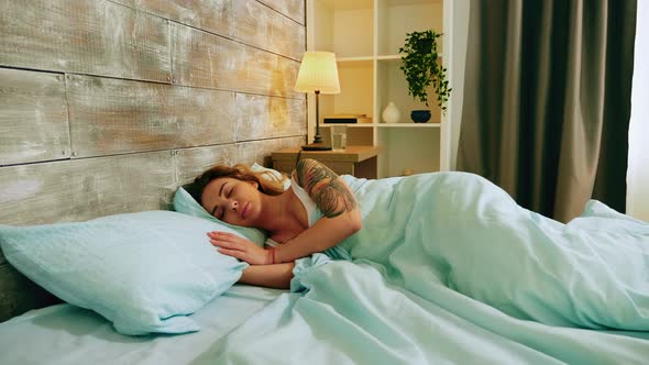 Calm Beautiful Young Woman Sleeping Well alt