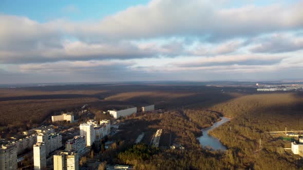Aerial forest and lake in Kharkiv city, epic sky