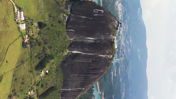 Vertical Footage The Rock of Guatape Colombia aerial view