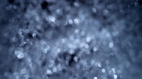 Abstract Blue Bokeh Macro Full Frame Water Droplet Texture Loop Template with Defocused Lights