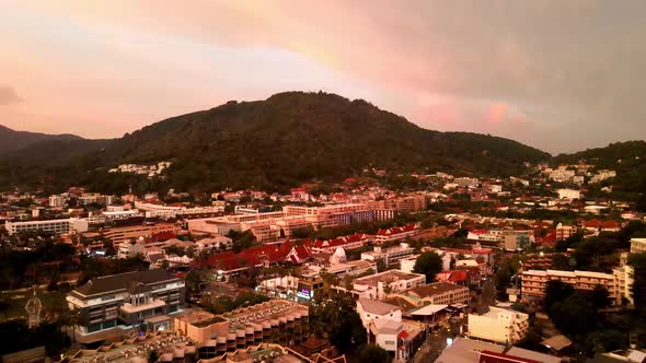 Aerial Sunset View Of Phuket Urban Landscape Near Kata Beach. Rising, Dolly Forward alt