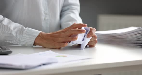 Businesswoman and Lawyer with Pile of Crumpled Paper alt