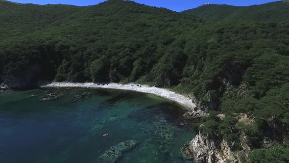 Aerial Shot of Exotic Tropical Ocean Coast on Sunny Day alt