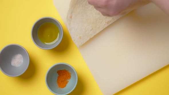 Vertical Tabletop Video Chef Cookes Mexican Food Man Slices Corn Tortilla to the Small Nachos