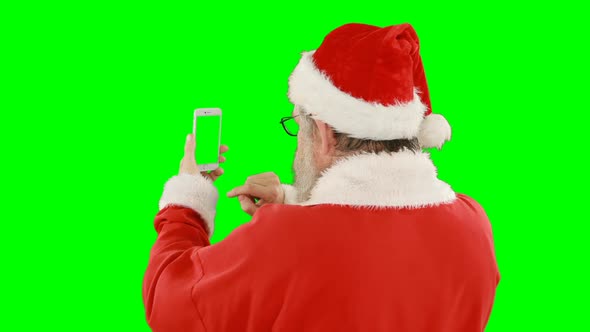 Santa claus using mobile phone alt