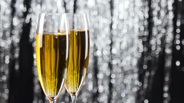 Two Champagne Glasses over Bokeh