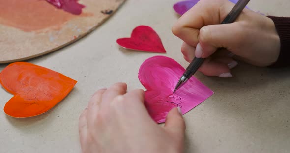 Signing Handmade Cards for Valentine's Day