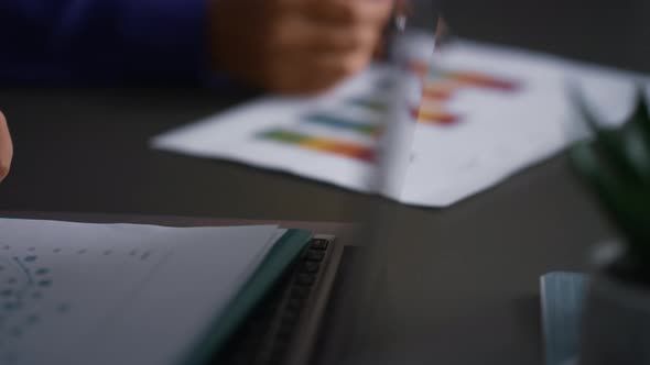 Business Consultant Hands Write Corporate Papers Research Charts in Office Table alt